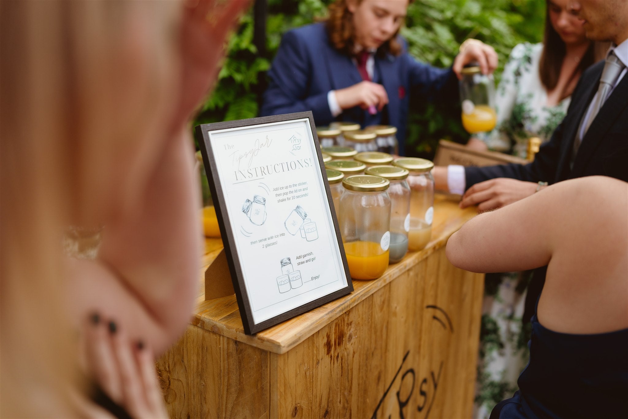 Tipsyjars set up at an event for guests to self serve cocktails